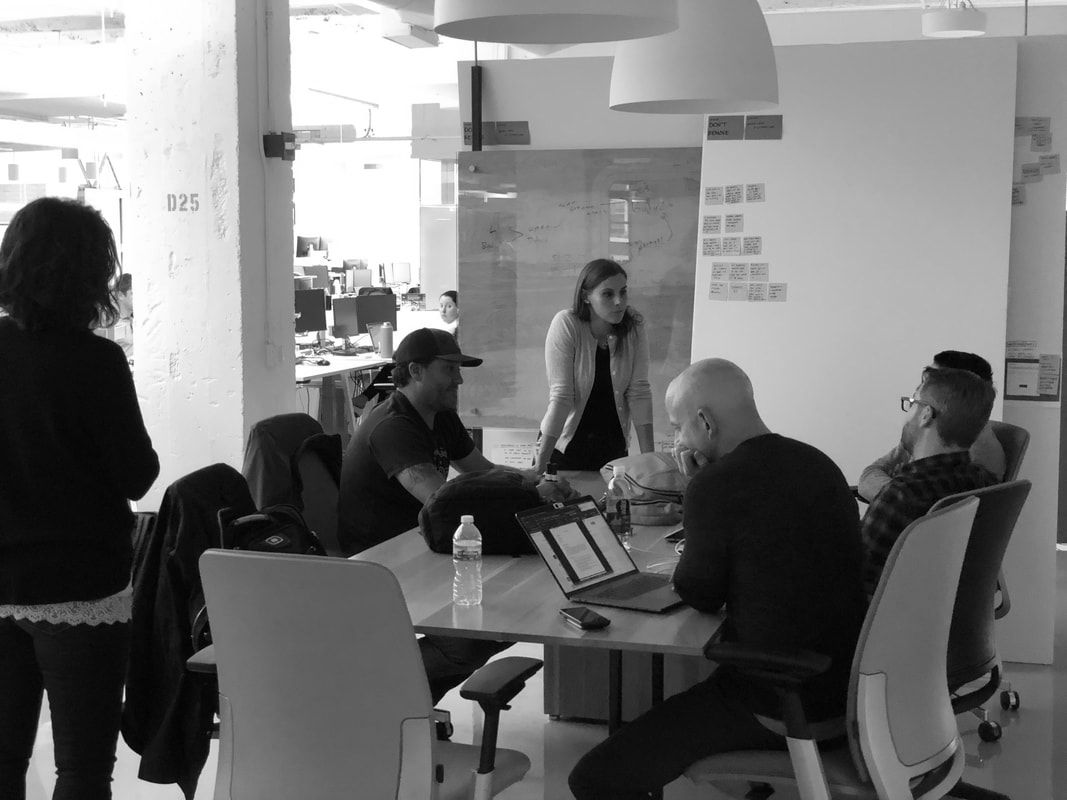 Ammon Curtis working with team